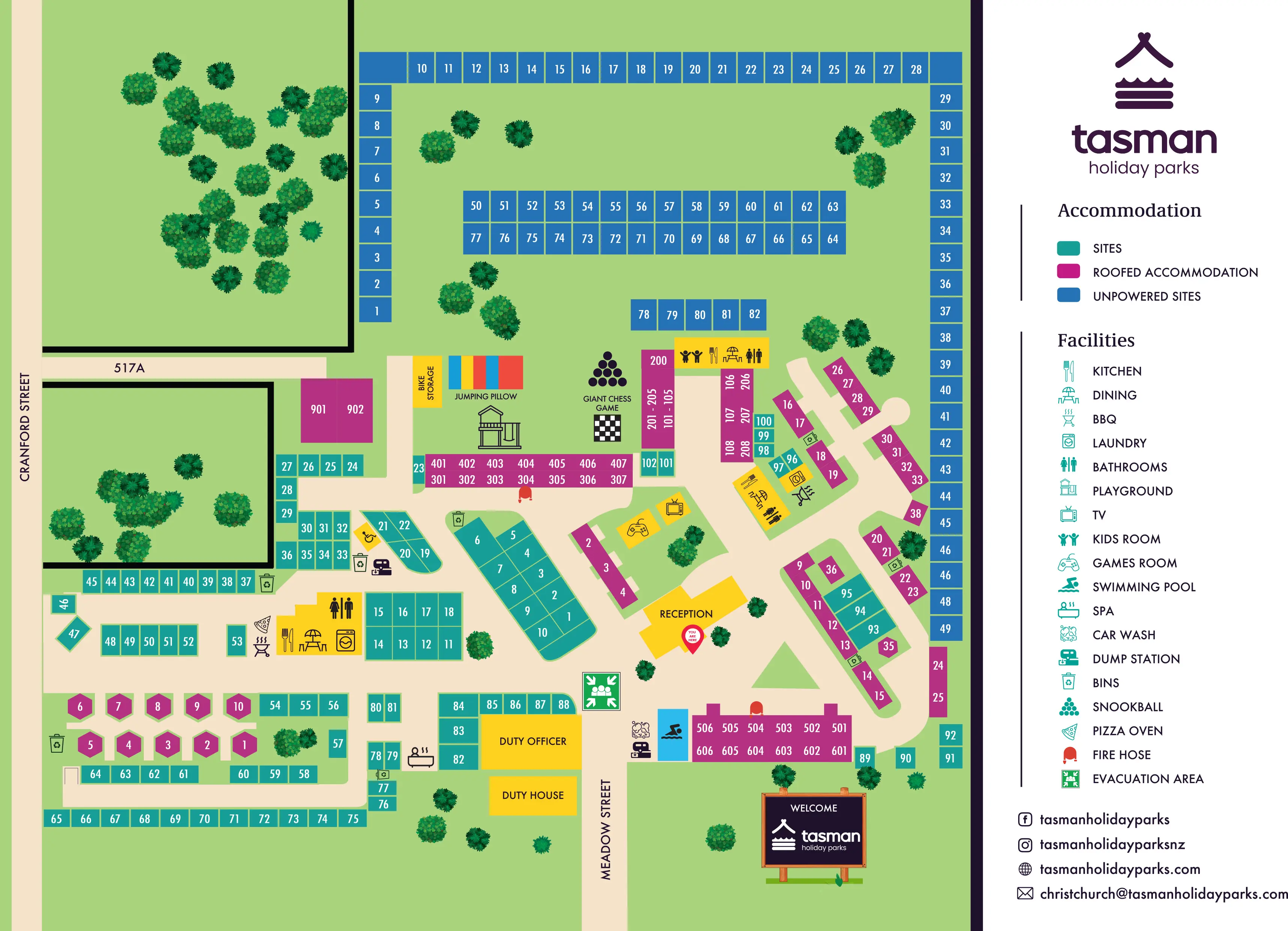 A colourful Tasman Holiday Parks map showing accommodation blocks, amenities, numbered sites, trees, walkways, and a reception area with legend.